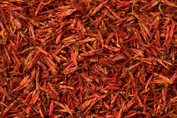 Safflower, imatation saffron, close up Safflower, imatation saffraan, close up full frame substitute for saffron stock pictures, royalty-free photos & images
