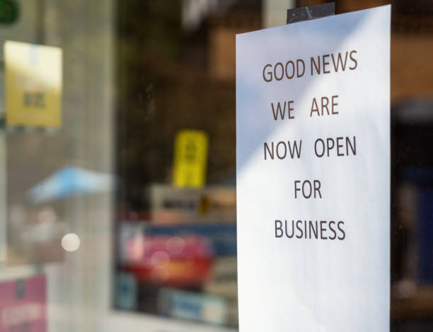 istock Shop re-opening sign 1254975398