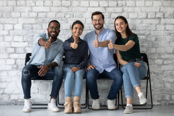istock Applicants passed job interview getting position showing thumbs up 1254975575
