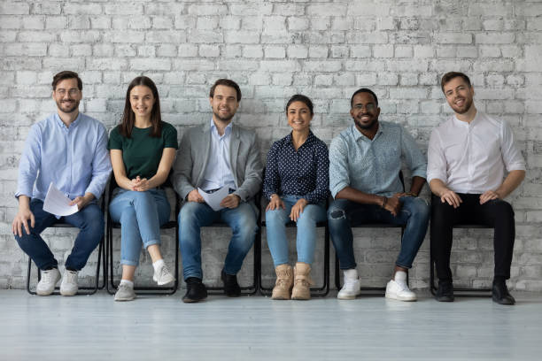 istock Multiethnic people applicants wait for job interview feels confident 1254975600