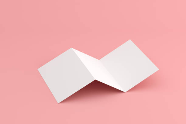 istock Mock up of blank square brochure on pink background. 3d render. 1254975918