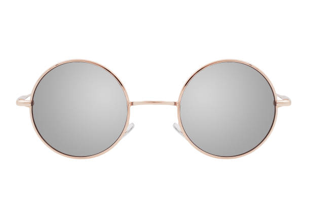 istock Round sunglasses with a gold frame and mirror lenses isolated on white background. 1254976449
