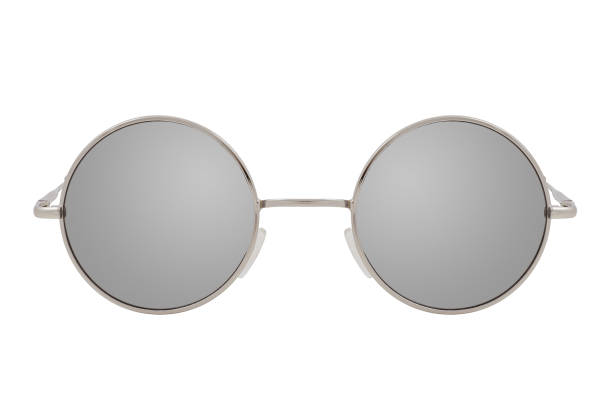 istock Round sunglasses with a silver frame and mirror lenses isolated on white background. 1254976456