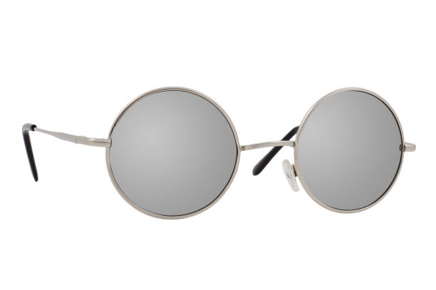 istock Round sunglasses with a silver frame and mirror lenses isolated on white background. 1254976458