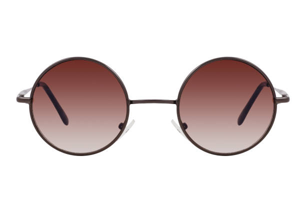 istock Round sunglasses with a black frame and brown gradient lenses isolated on white background. 1254976466