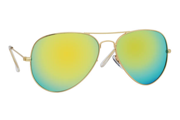 istock Sunglasses with a gold frame and yellow mirror lens isolated on white background. 1254976472