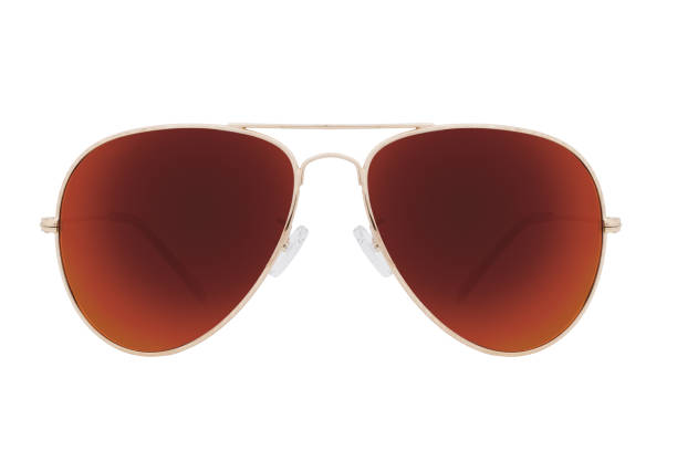 istock Sunglasses with a gold frame and brown lens isolated on white background. 1254976484