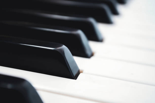 istock Piano keys close-up, soft focus, blurred background. 1254977208