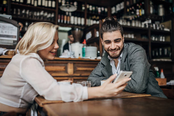 istock Young couple on coffee break in cafe 1254985270