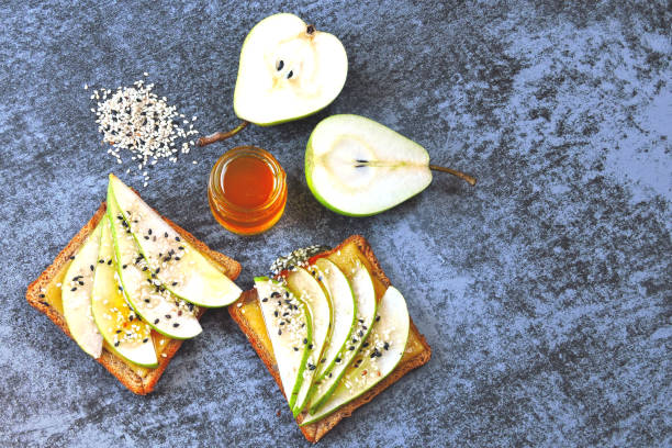 istock Toast with pear, cheese and honey. 1254986404