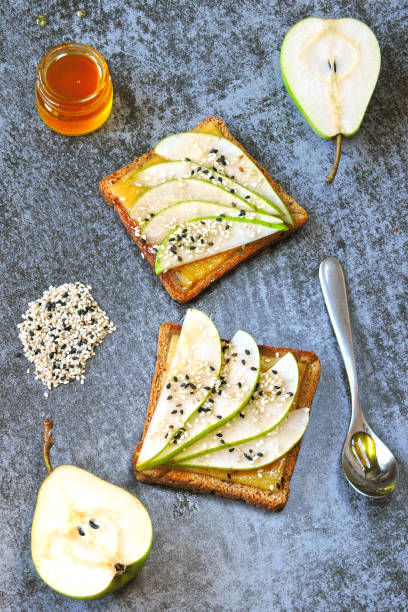 istock Toast with pear, cheese and honey. 1254986405