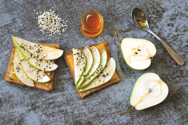 istock Toast with pear, cheese and honey. 1254986410