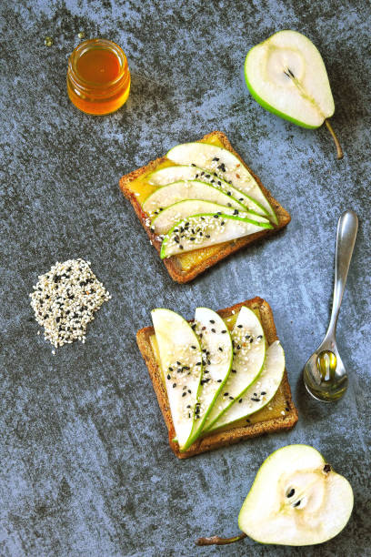 istock Toast with pear, cheese and honey. 1254986415