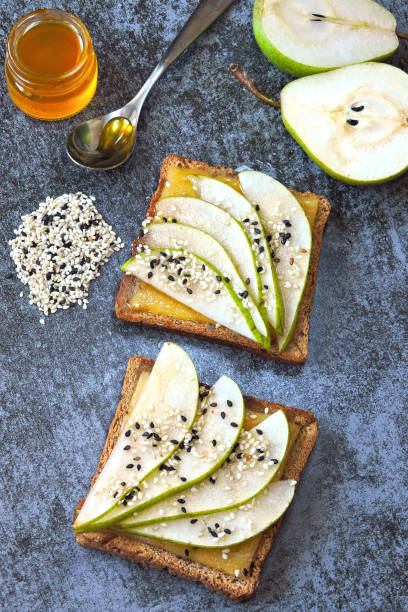 istock Toast with pear, cheese and honey. 1254986416
