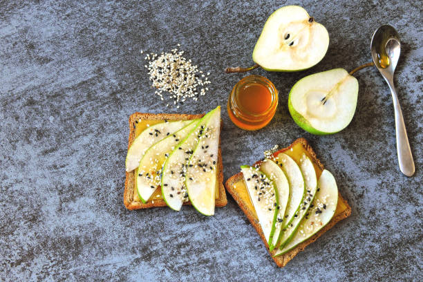 istock Toast with pear, cheese and honey. 1254986418