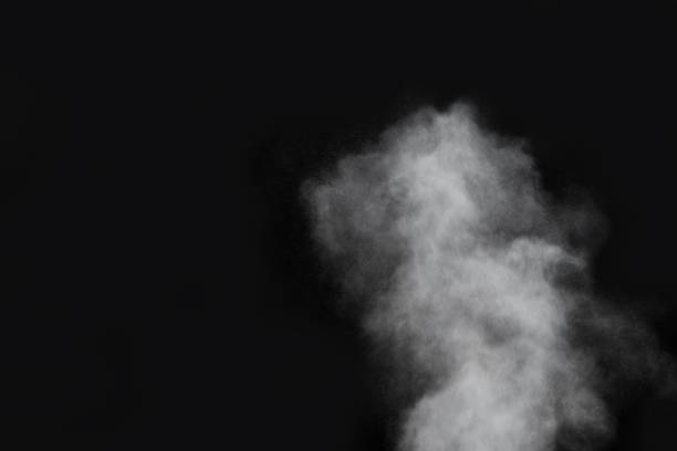 istock White smoke isolated on a black background. smoke image 1254987812