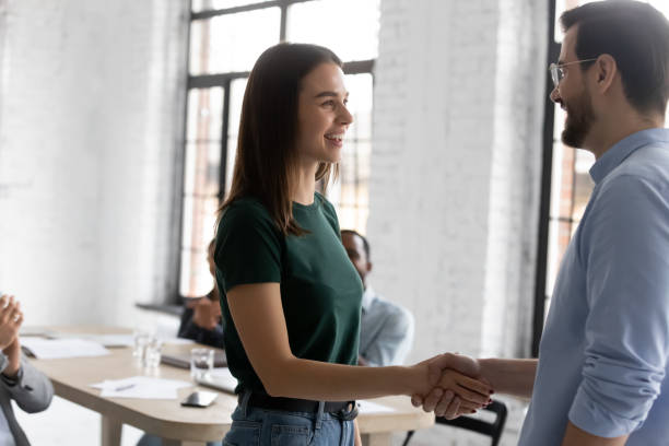 istock Employee got promoted receive praise from boss during briefing 1254989167