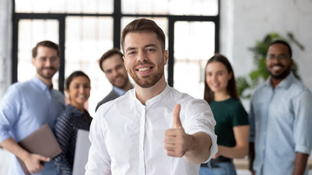 istock Client pleased with service showing thumbs up express positive feedback 1254989177