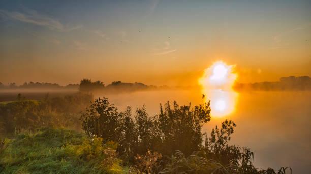 istock fog at the the dawn river 1254991377