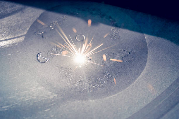 Laser sintering machine for metal. 3D printer printing metal. Laser sintering machine for metal. Metal is sintered under the action of laser into desired shape in working chamber. 3D printer printing metal. Modern additive technologies 4.0 industrial revolution 3d printing photos stock pictures, royalty-free photos & images