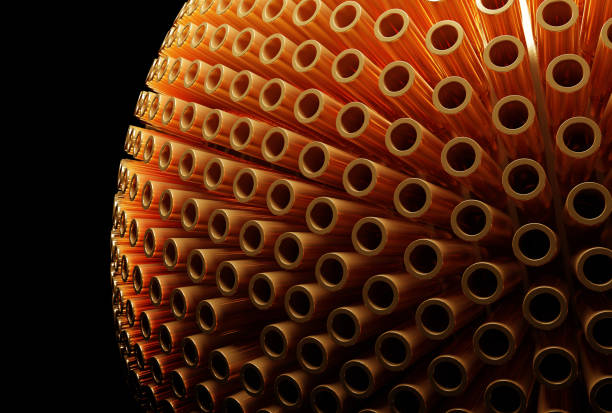 Texture of many copper tubes close-up on a black background.