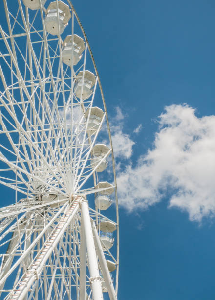 istock Amusement ride against blue sky. 1254994174