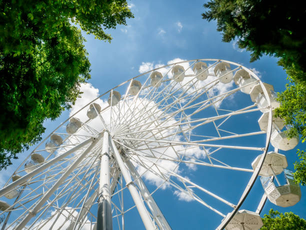 istock Amusement ride against blue sky. 1254994177