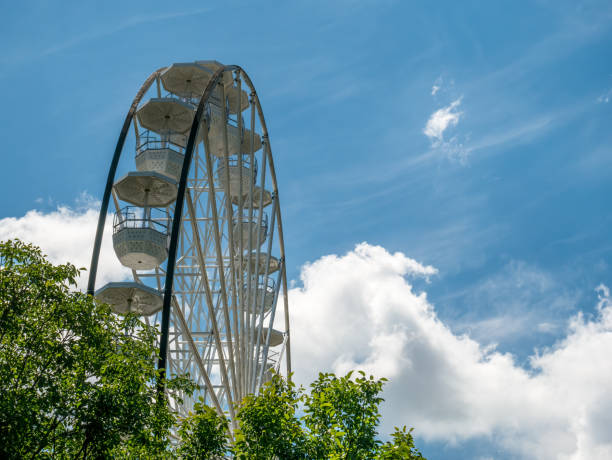istock Amusement ride against blue sky. 1254994225