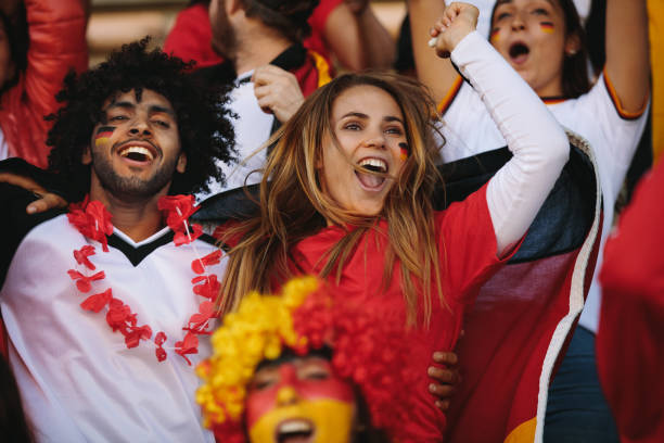 istock German spectators in stadium cheering their national team 1254995478
