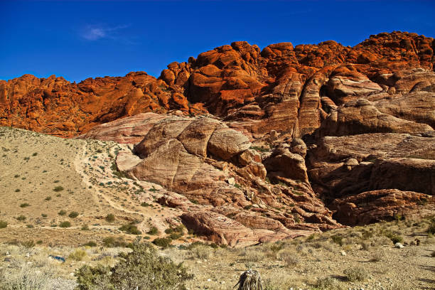 istock Red Rock Canyon State Park features scenic desert cliffs, buttes and spectacular rock formations. The park is located where the southern tip of the Sierra Nevada converges with the El Paso Mountains. 1254996143
