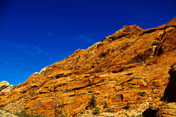istock Red Rock Canyon State Park features scenic desert cliffs, buttes and spectacular rock formations. The park is located where the southern tip of the Sierra Nevada converges with the El Paso Mountains. 1254997839