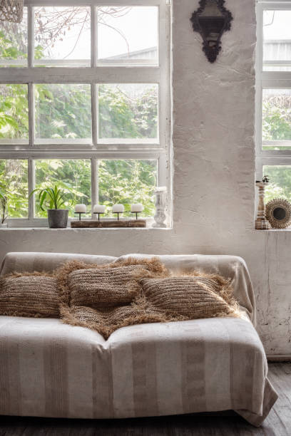 istock Comfortable living room interior in bohemian style 1254998587