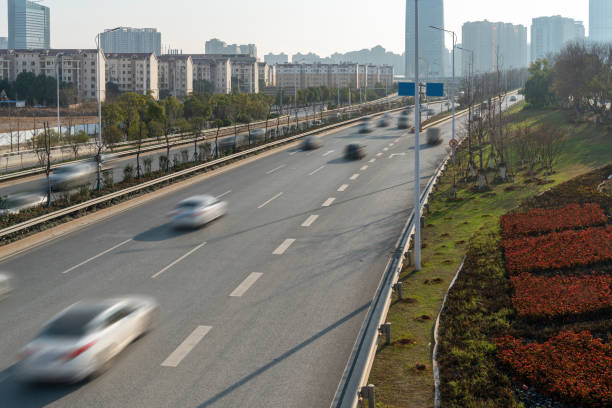 istock Highway and viaduct under the blue clouds 1255002492