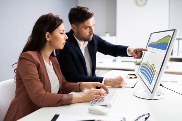 istock Financial Advisor And Business Analyst Working 1255007427