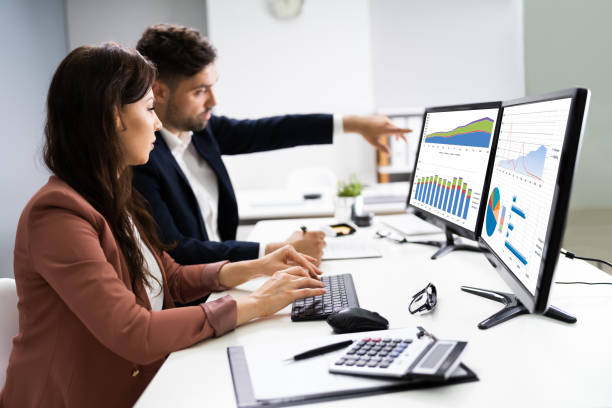 istock Financial Advisor And Business Analyst Working 1255007442
