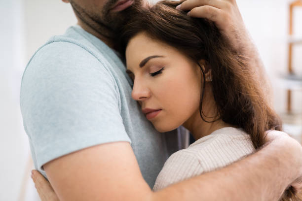 istock Man Boyfriend Hugging Depressed Woman Girlfriend 1255007789