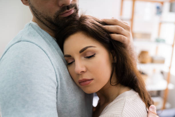 istock Man Boyfriend Hugging Depressed Woman Girlfriend 1255007792