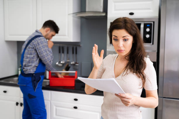 istock Customer Woman With Expensive Repairs Invoice 1255007877