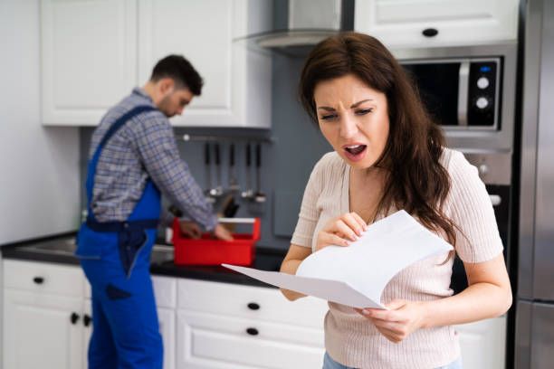 istock Customer Woman With Expensive Repairs Invoice 1255007881