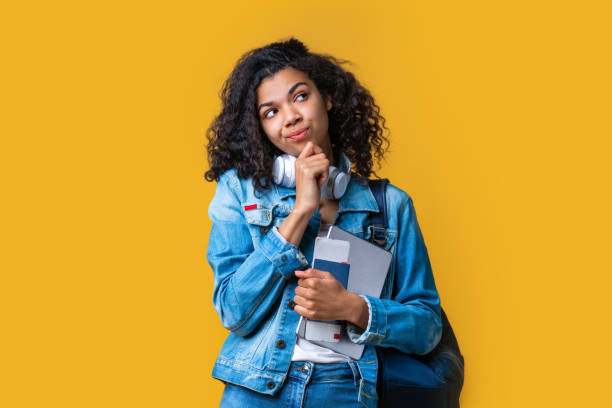 istock Thoughtful girl tourist with a backpack dissapointed at flight delay 1255008595