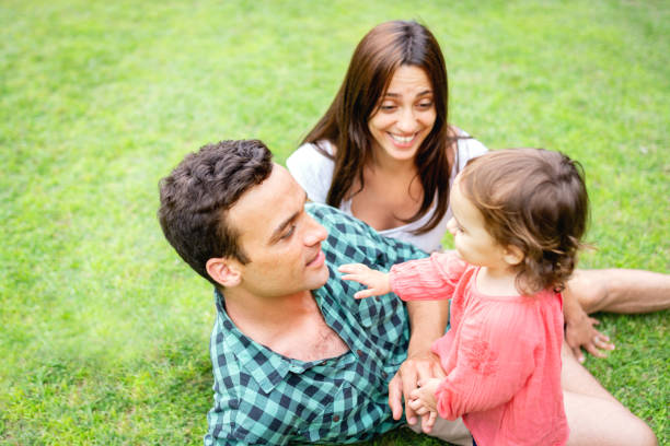 istock Family having fun together outdoors in the nature 1255008636