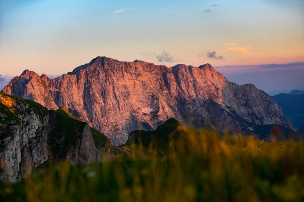 istock Mountains in Julian Alps Illuminated During Sunset in Summer 1255008860