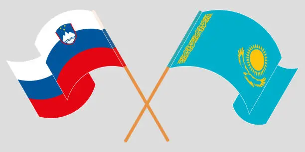 Vector illustration of Crossed and waving flags of Kazakhstan and Slovenia