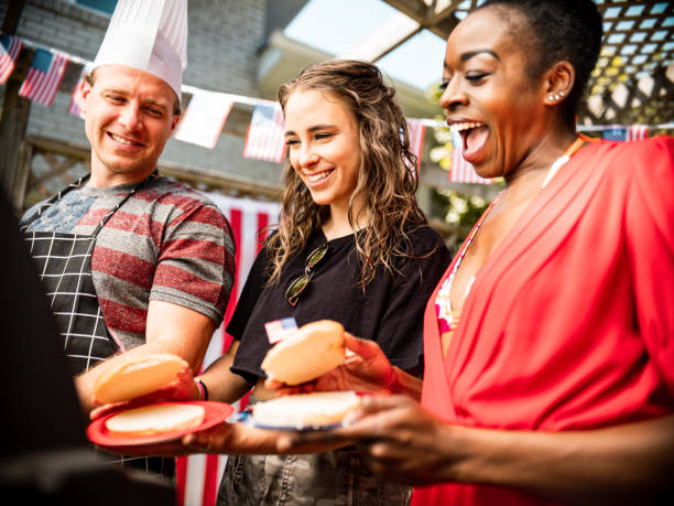 istock Burger line up at 4th July BBQ 1255013664