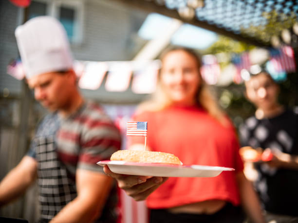 istock Burger line up at 4th July BBQ 1255013819