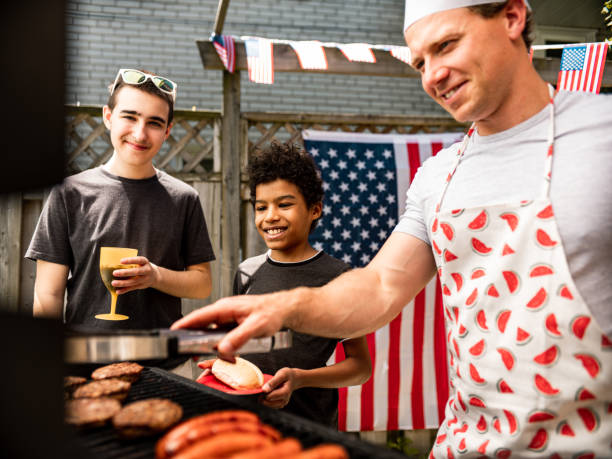 istock Burger line up at 4th July BBQ 1255013858
