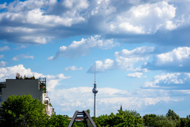 istock Berlin City view with TV-Tower under blue sky and clouds 1255013890