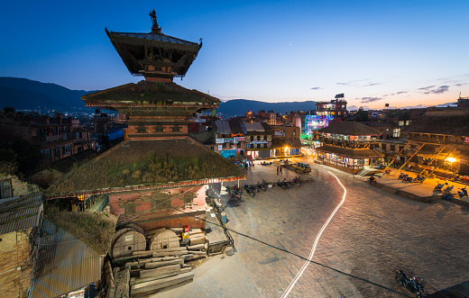 Blue dusk skies above the ancient towers of Taumadhi Square in Bhaktapur, the UNESCO World Heritage Site in Kathmandu, Nepal's vibrant capital city.