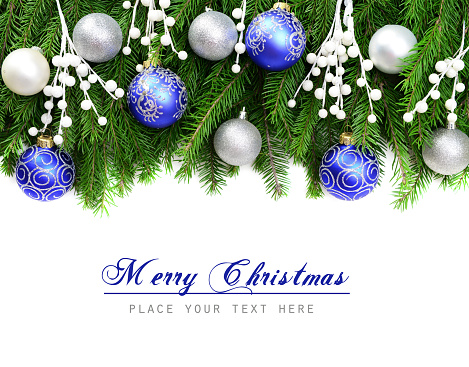 christmas trees and christmas decorations on white background
