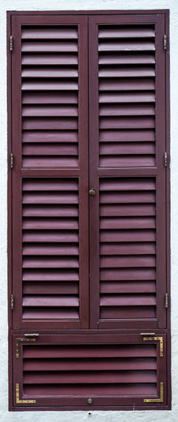 istock Old wooden vintage louver window 1255020310